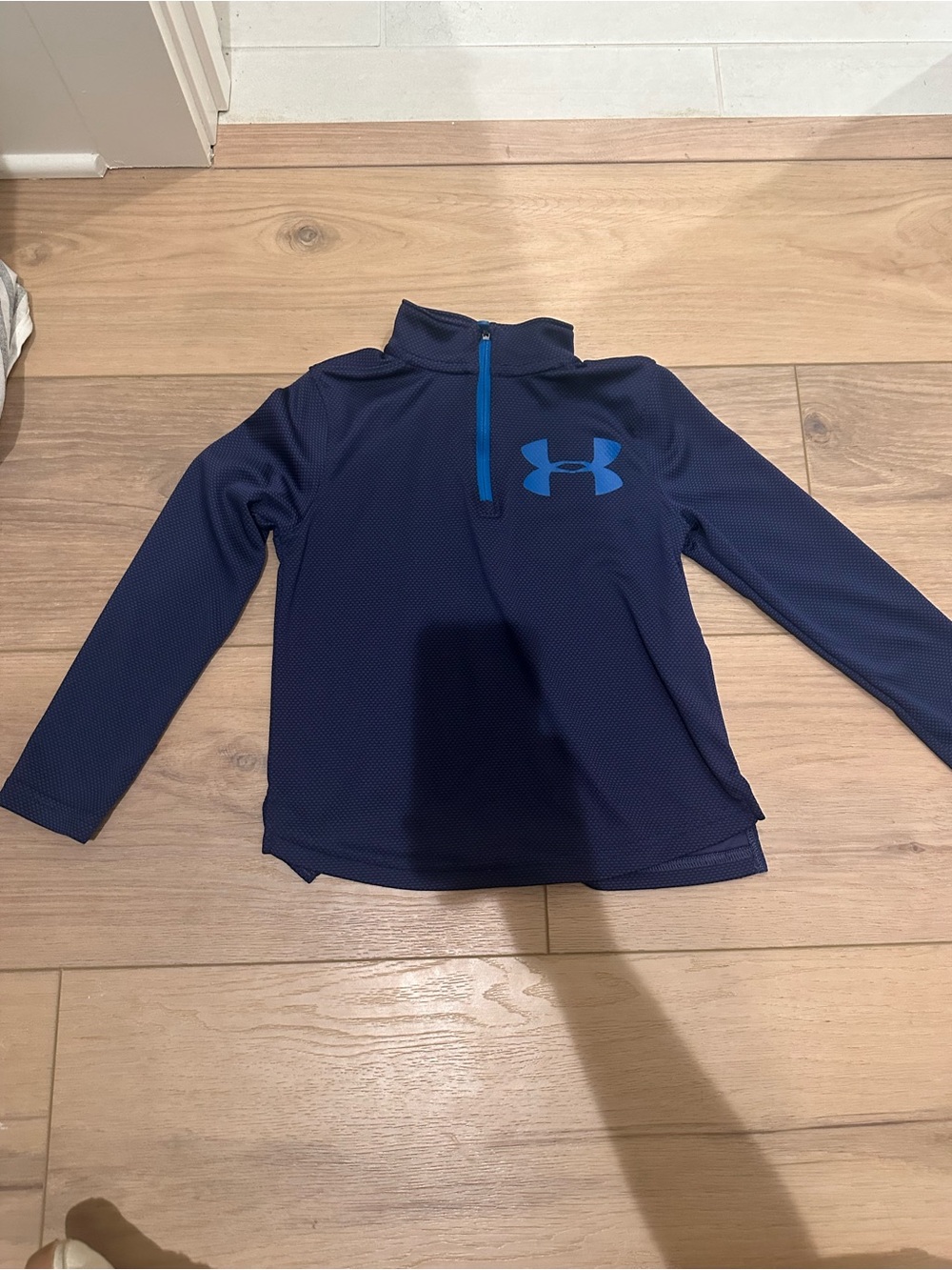 Under Armour Kids Navy Blue Long Sleeve half zip with Bright Blue Logo
